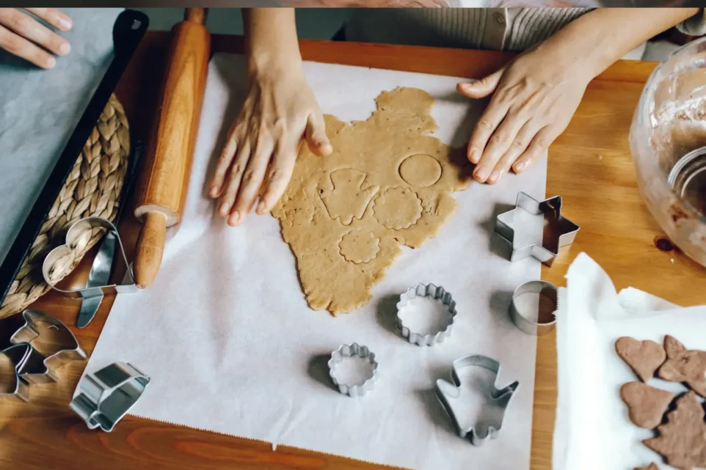 cutting cookie dough into shapes